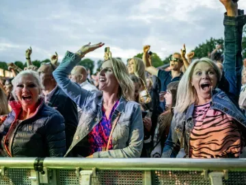 A group of women enjoying the live music at Windsor Races