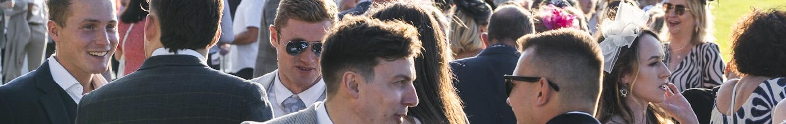 The crowd at the track side at Windsor Races Gents day