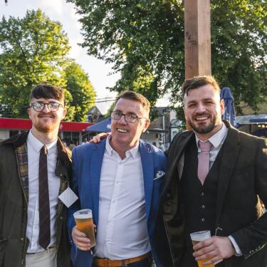 Three guys enjoying a day out at Windsor Races Gents Day.