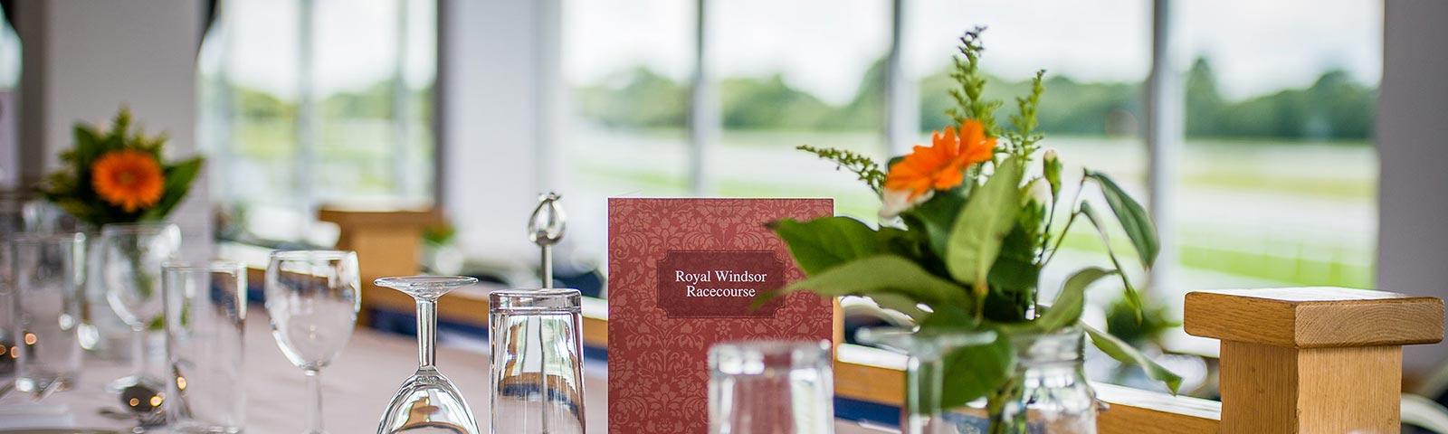 Clean and fresh glasses set out on a table waiting for guests to arrive.