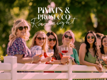 Girls drinking cocktails at the races